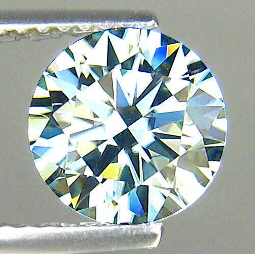 Moissanite 1.44ct Round Top Rich Fire Pale Blue Greenish VVS: Title: Moissanite 1.44ct Round Top Rich Fire Pale Blue Greenish VVS Additional Information: 1 x Moissanite 1.44ct Round Top Rich Fire Pale Blue Greenish VVS - Shape: Round - Weight: 1.44ct - Colour: P