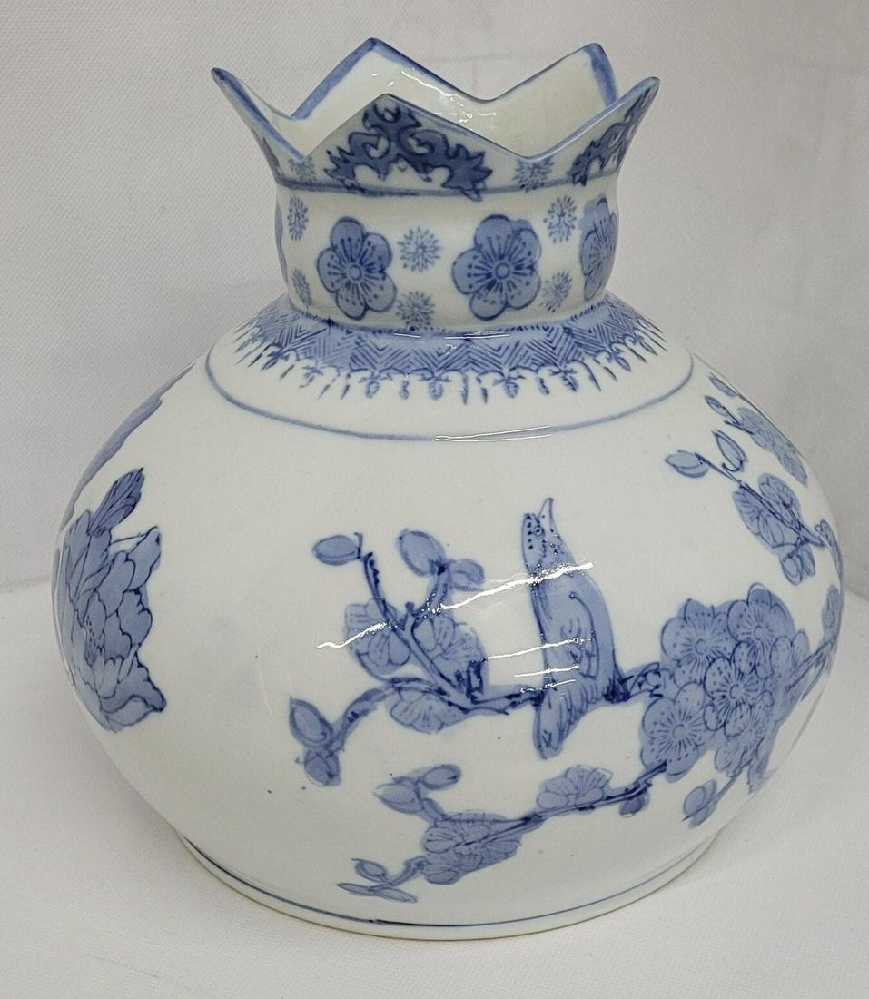 Vintage Asian Table Vase Antique Oriental Blue White Birds Unique Design: Vintage from the 1990s Materials: ceramic, pottery Width: 8 inches Height: 9 inches Depth: 8 inches Description Vintage Asian Table Vase Antique Oriental Blue White Birds Unique Design In good working
