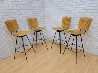 Mid Century Modern Arthur Umanoff Slat-Wood Steep Base Swivel Stools - Set of 4: Vintage from the 1960s Materials: metal, wood Overall width: 17 inches Overall height: 42 inches Overall depth: 18 inches Seat height: 29 inches Description Mid Century Modern Arthur Umanoff Slat-Wood