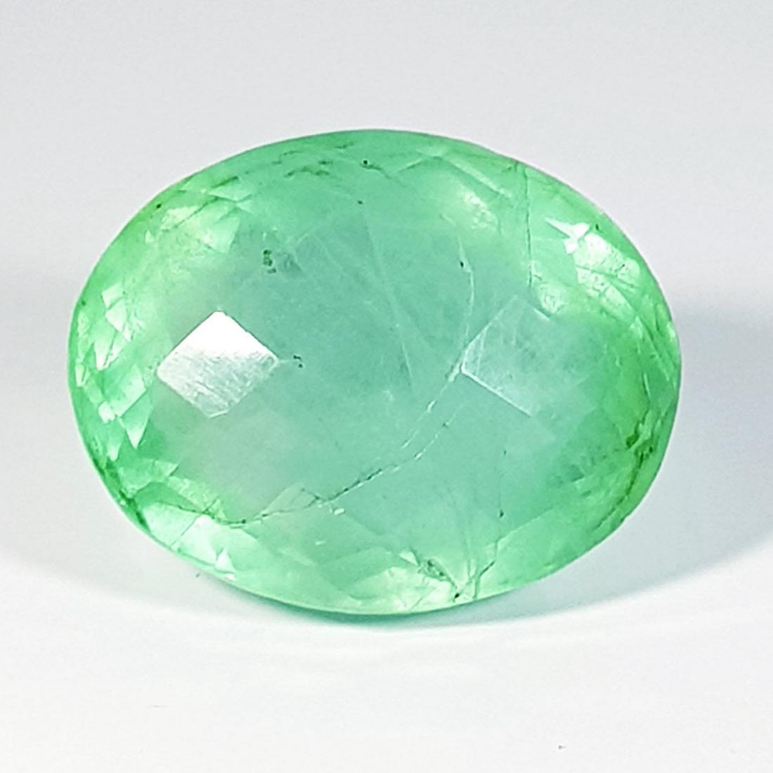 59.29 Ctz Fine Colombian Green Natural Fluorite: No Reserve! Title: 59.29 Ctz Fine Colombian Green Natural Fluorite Color/Clarity: Green / VS Gemstone: Fluorite Carat Weights: 59.29 Size: 25.09 x 19.90 x 16.35 Additional Information: Oval / Brazil S