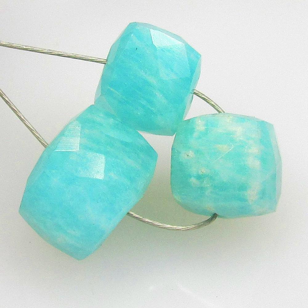 7.63 Ctw Natural 3 Drilled Amazonite Square Beads: No Reserve! Title: 7.63 Ctw Natural 3 Drilled Amazonite Square Beads Stone Clarity: Opaque Gemstones: Natural Amazonite Beads Carat Weights: 7.63 Size/Dimensions: 6.6x6.6 - 7.8x7.8 mm / 3 Pc's Additio