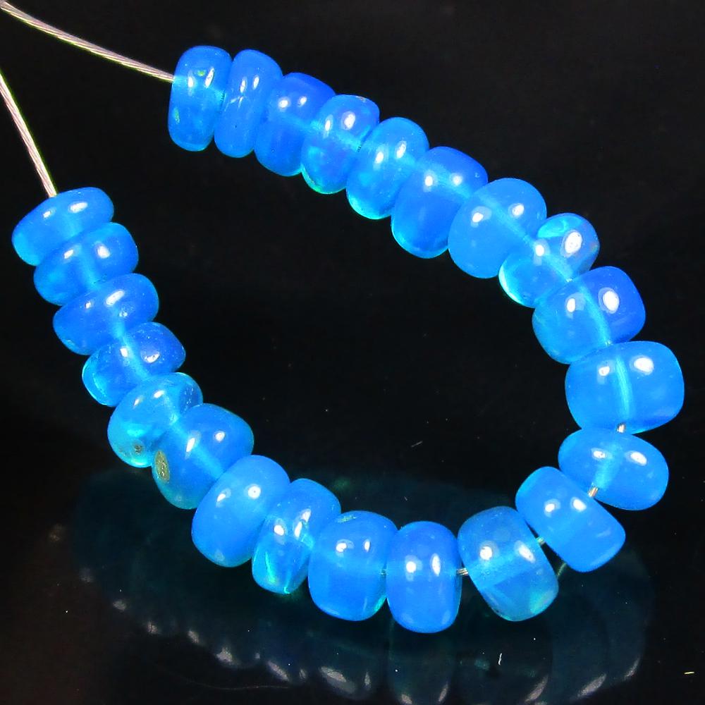4.75 Ctw Natural 23 Drilled Blue Fire Opal Beads: No Reserve! Title: 4.75 Ctw Natural 23 Drilled Blue Fire Opal Beads Stone Clarity: Transparent Gemstones: Natural Blue Opal Beads Carat Weights: 4.75 Size/Dimensions: 4.10 to 4.50 mm / 23 PC's Additio