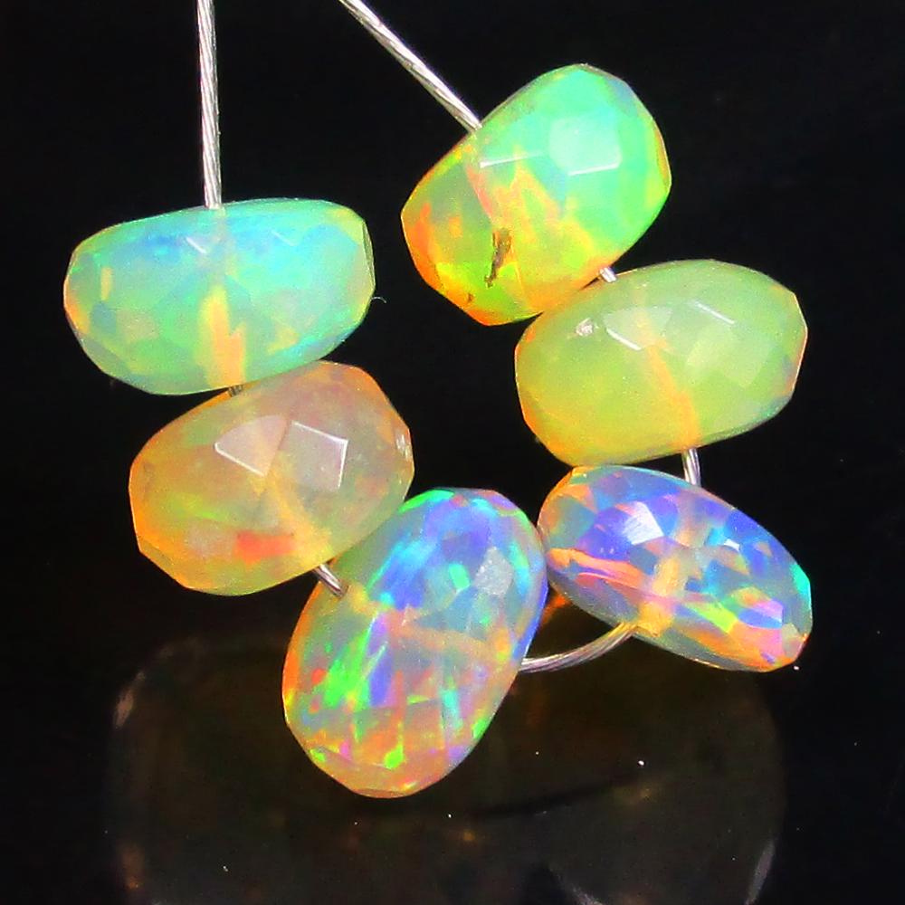 3.55 Ctw Natural 6 Drilled Faceted Fire Opal Beads: No Reserve! Title: 3.55 Ctw Natural 6 Drilled Faceted Fire Opal Beads Stone Clarity: Transparent Gemstones: Natural Faceted Fire Opal Beads Carat Weights: 3.55 Size/Dimensions: 5.50 to 6.30 mm / 6 PC'