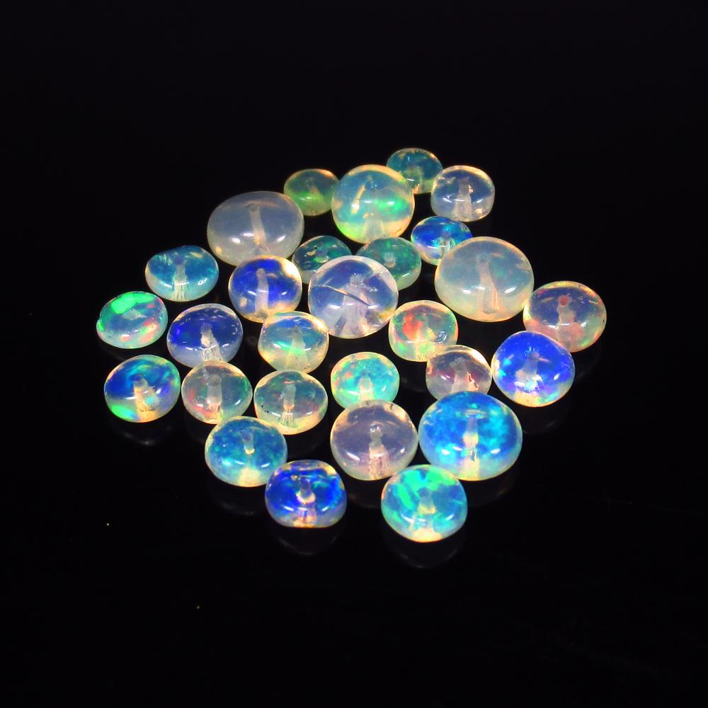 Natural Multicolor Opal Beads - 8.75 Ct: No Reserve! Title: Natural Multicolor Opal Beads - 8.75 Ct Origin: Ethiopia Weight: 8.75 Size/Dimensions: 4.3 - 6.2 mm Additional Information: Pieces : 28 No's / Shape : Drilled Round Beads / Clarity 