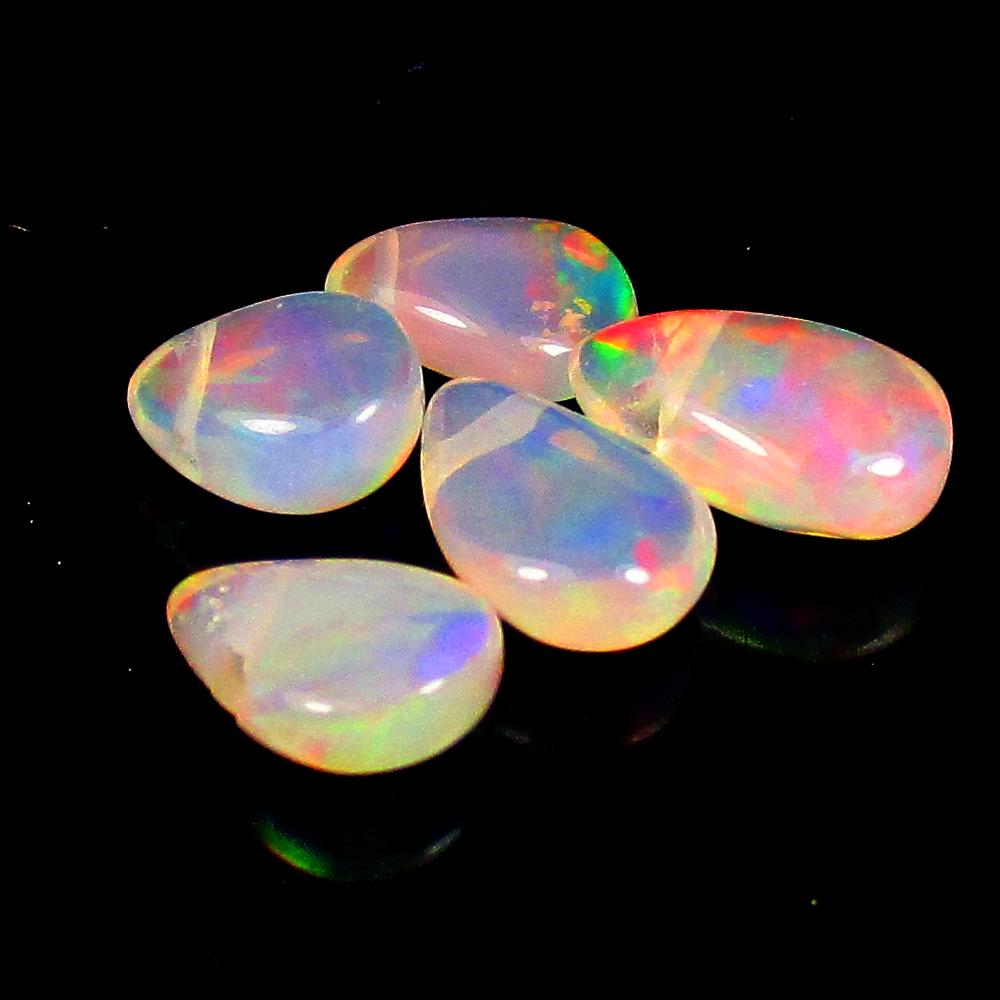 2.16 Ctw Natural 5 Drilled Multi-Color Fire Opal Pear Beads: No Reserve! Title: 2.16 Ctw Natural 5 Drilled Multi-Color Fire Opal Pear Beads Stone Clarity: Transparent Gemstones: Natural Pear Opal Beads Carat Weights: 2.16 Size/Dimensions: 5.8x5.3 - 7.9x5.2 mm /