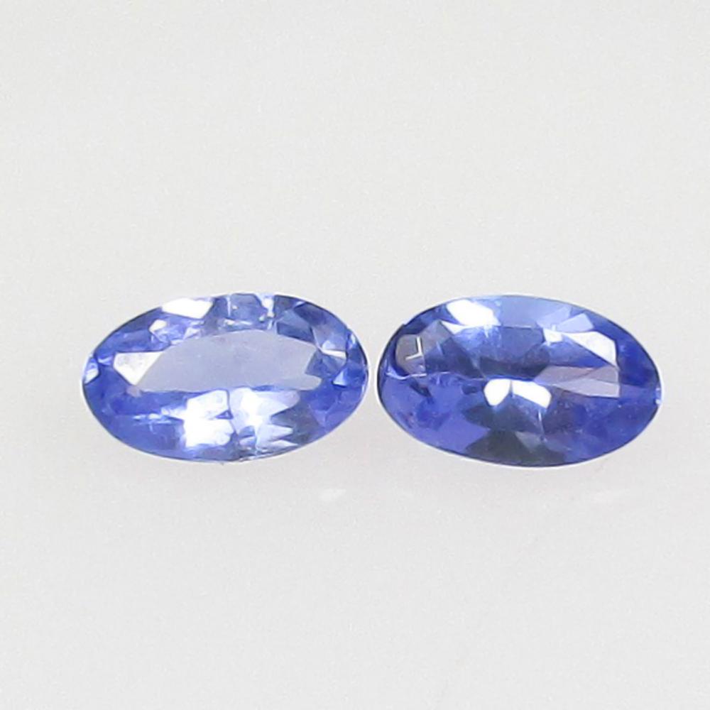 0.41 Ctw Natural Tanzanite Oval Pair: No Reserve! Title: 0.41 Ctw Natural Tanzanite Oval Pair Stone Clarity: VVS Gemstones: Natural Tanzanite Carat Weights: 0.41 Size/Dimensions: 5.10 x 3.10 x 2.10 mm / 2 Pc's Additional Information: Top 