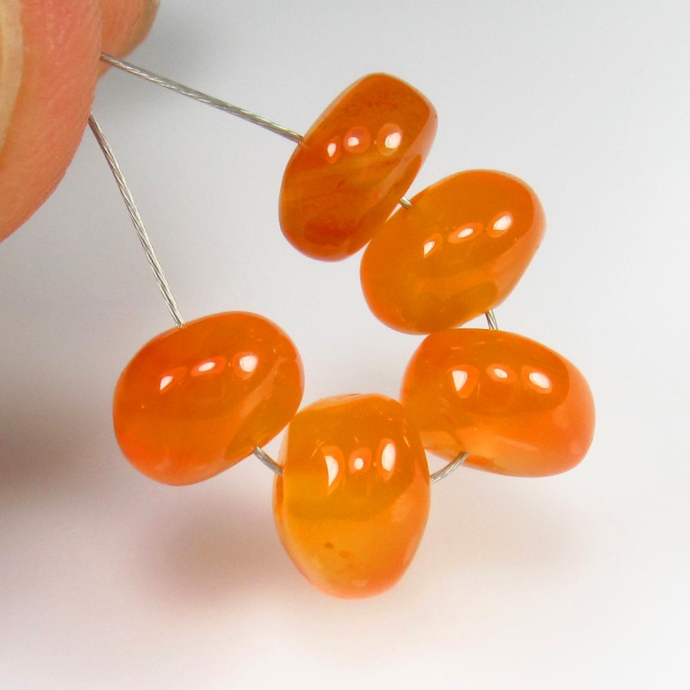 9.24 Ct - Natural Carnelian Beads: No Reserve! Title: 9.24 Ct - Natural Carnelian Beads Additional Information: Gemstone Gemstones: Carnelian Beads Carat Weights: 9.24 Size/Dimensions: 7.0 - 7.2 mm Additional Information: Pieces : 5 No
