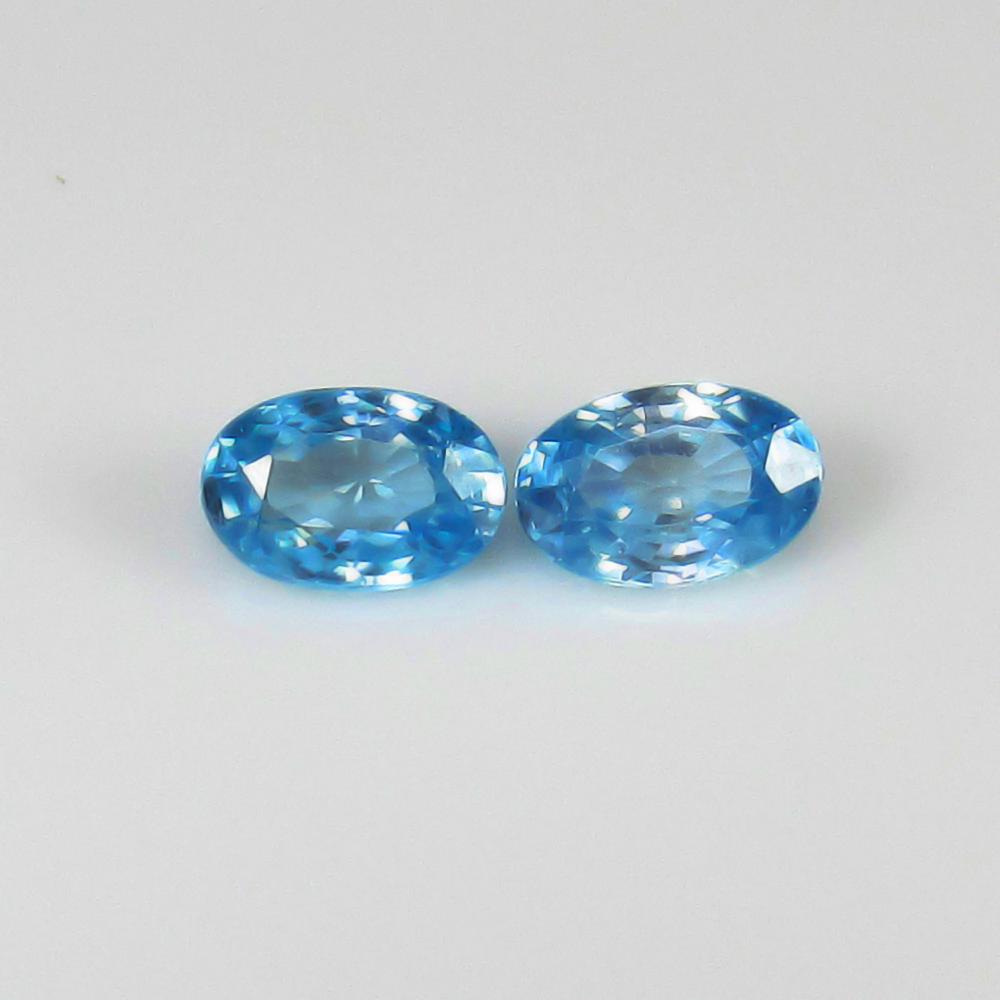 Natural Blue Zircon Pair - 1.35 Ct: No Reserve! Title: Natural Blue Zircon Pair - 1.35 Ct Origin: Combodia Weight: 1.35 Size/Dimensions: 6.0 x 4.0 x 3.1 mm Additional Information: Pieces : 2 No's / Shape : Oval Cut / Color : Blue / Clar