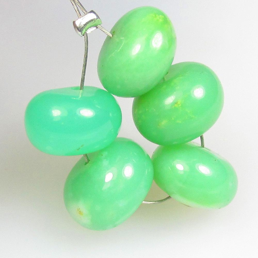 14.96 Ctw Natural 5 Drilled Chrysoprase Round Beads: No Reserve! Title: 14.96 Ctw Natural 5 Drilled Chrysoprase Round Beads Stone Clarity: Semi-Transparent Gemstones: Natural Chrysoprase Beads Carat Weights: 14.96 Size/Dimensions: 8.30 - 8.80 mm / 5 Pc'