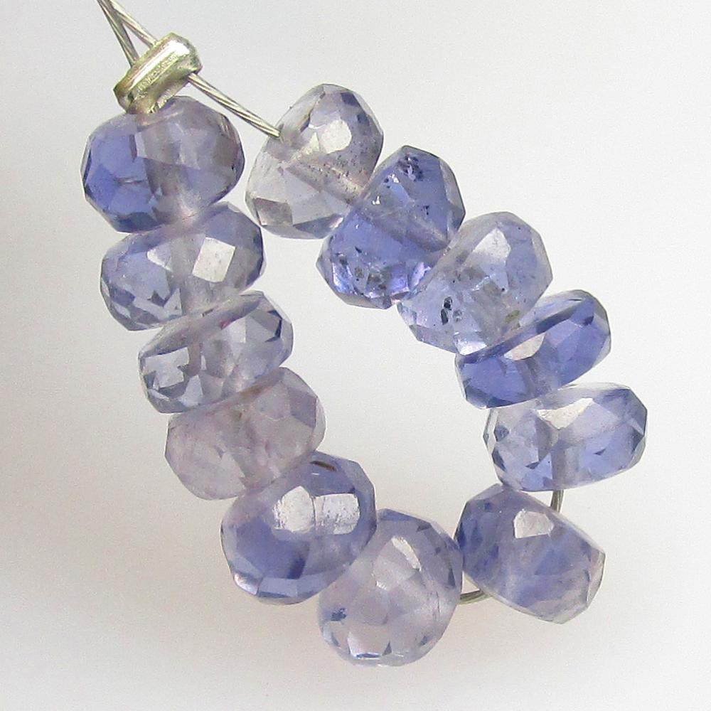 5.04 Ctw Natural 12 Iolite Drilled Round Beads: No Reserve! Title: 5.04 Ctw Natural 12 Iolite Drilled Round Beads Stone Clarity: Transparent Gemstones: Natural Iolite Carat Weights: 5.04 Size/Dimensions: 4.50 - 5.00 mm / 12 P'cs Additional Informat