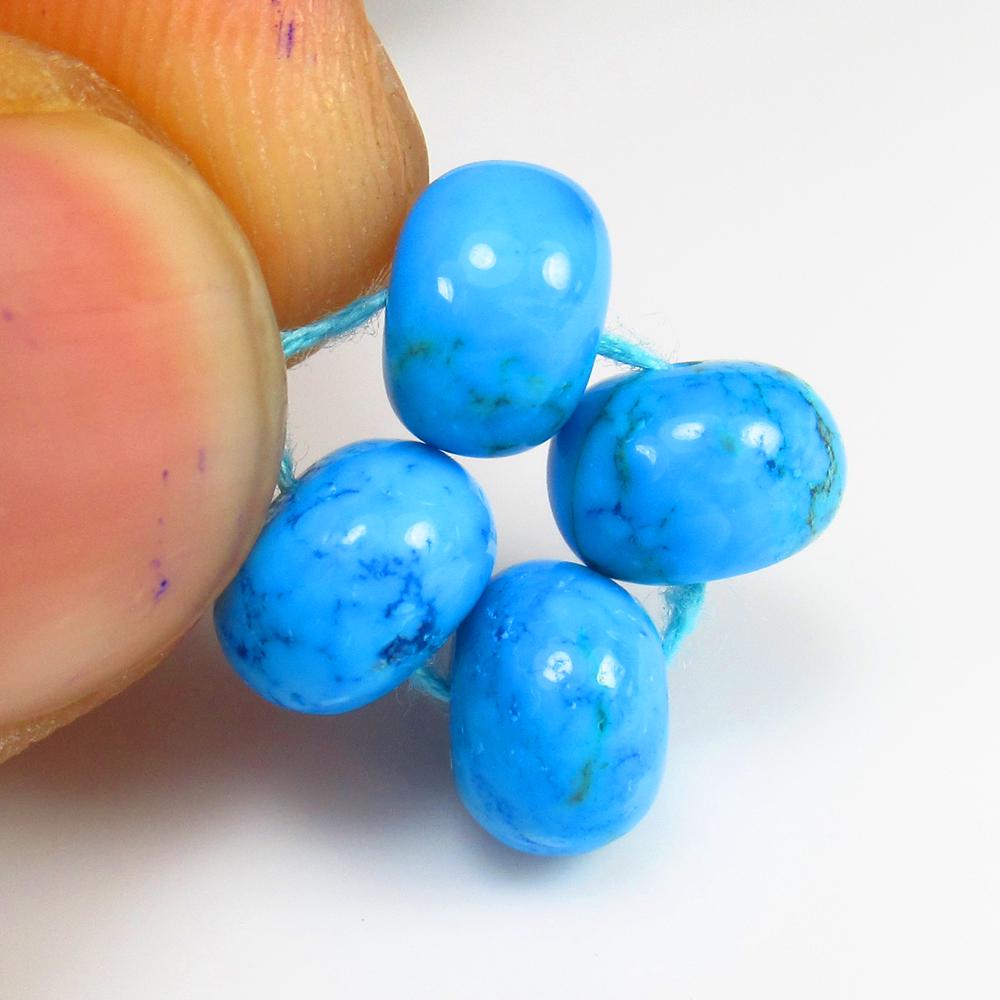 Natural Turquoise Beads - 9.22 Ct: No Reserve! Title: Natural Turquoise Beads - 9.22 Ct Origin: Africa Weight: 9.22 Size/Dimensions: 7.5 - 7.7 mm Additional Information: Pieces : 4 No's / Shape : Round Drilled / Color : Blue / Clarity 