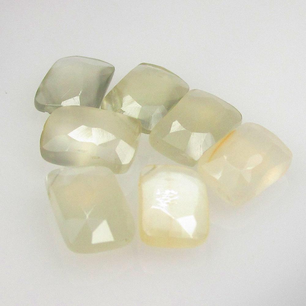 9.44 Ctw Natural 7 Moonstone Octagon Beads: No Reserve! Title: 9.44 Ctw Natural 7 Moonstone Octagon Beads Stone Clarity: Translucent Gemstones: Natural Moonstone Beads Carat Weights: 9.44 Size/Dimensions: 8.1x5.6 - 8.8x6.2 mm / 7 Pc's Additiona