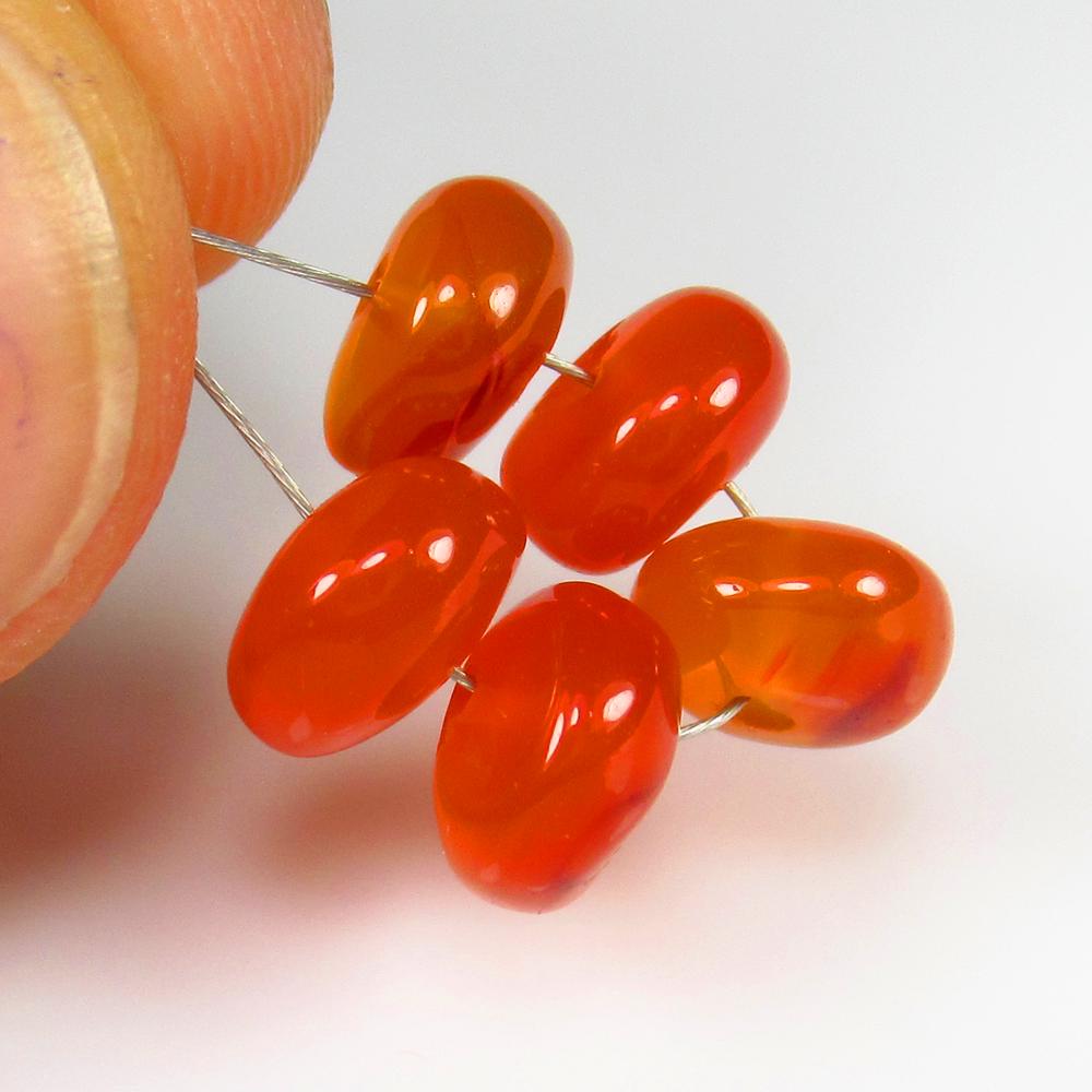 8.25 Ct - Natural Carnelian Beads: No Reserve! Title: 8.25 Ct - Natural Carnelian Beads Additional Information: Gemstone Gemstones: Carnelian Beads Carat Weights: 8.25 Size/Dimensions: 7.0 - 7.3 mm Additional Information: Pieces : 5 No