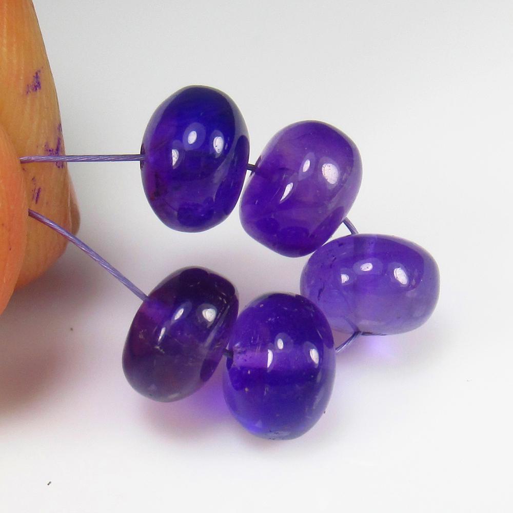 Natural Purple Amethyst Beads - 10.23 Ct: No Reserve! Title: Natural Purple Amethyst Beads - 10.23 Ct Origin: Brazil Weight: 10.23 Size/Dimensions: 7.1 - 7.4 mm Additional Information: Pieces : 5 No's / Shape : Drilled Round Beads / Color : P