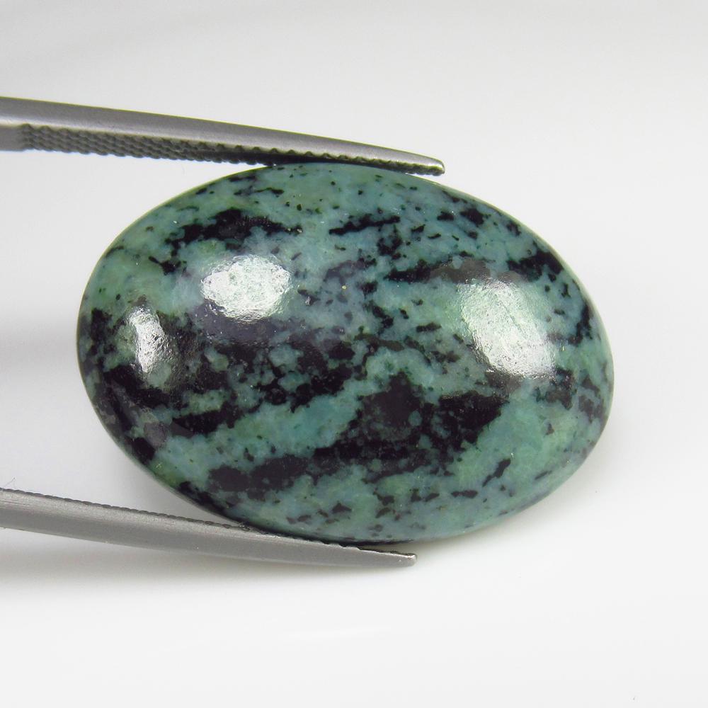 Natural Ocean Jasper - 26.71 Ct: No Reserve! Title: Natural Ocean Jasper - 26.71 Ct Origin: Brazil Weight: 26.71 Size/Dimensions: 27.0 x 18.5 x 6.2 mm Additional Information: Pieces : 1 No's / Shape : Oval Cabochon / Color : Blue / C