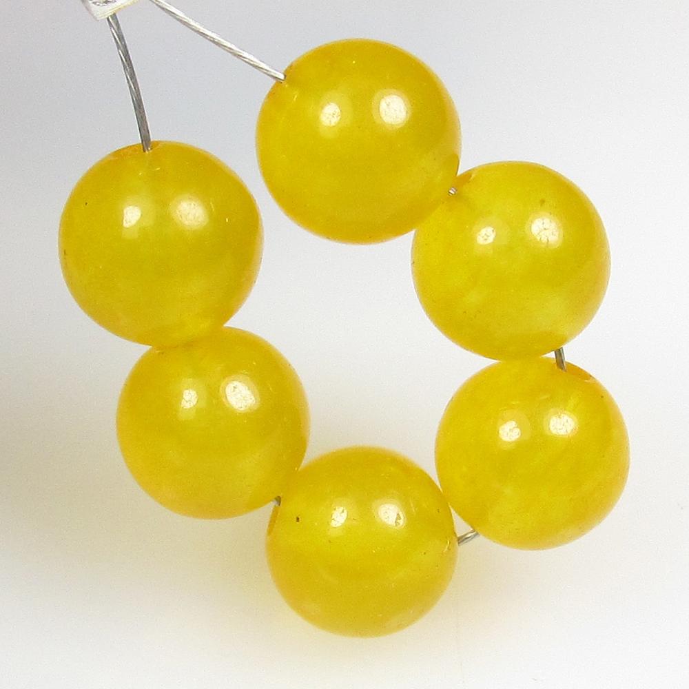 10.00 Ctw Natural 6 Drilled Yellow Onyx Round Beads: No Reserve! Title: 10.00 Ctw Natural 6 Drilled Yellow Onyx Round Beads Stone Clarity: Semi-Transparent Gemstones: Natural Onyx Beads Carat Weights: 10.00 Size/Dimensions: 6.10 - 6.40 mm / 6 Pc's Addit