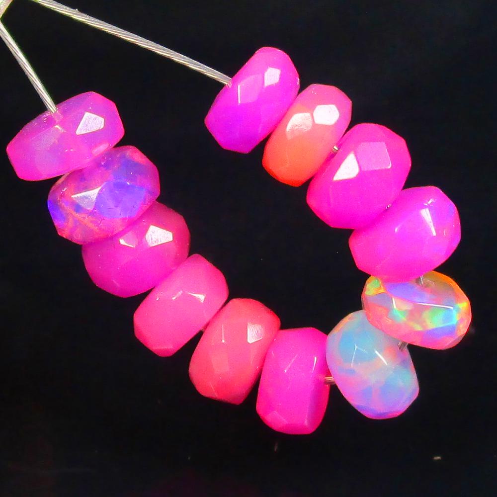 3.22 Ctw Natural 12 Drilled Pink Fire Opal Beads: No Reserve! Title: 3.22 Ctw Natural 12 Drilled Pink Fire Opal Beads Stone Clarity: Transparent Gemstones: Natural Fire Opal Beads Carat Weights: 3.22 Size/Dimensions: 4.40 - 5.00 mm / 12 P'cs Addition