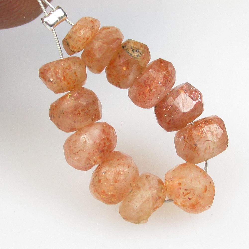 9.46 Ctw Natural 12 Drilled Orange Sunstone Round Beads: No Reserve! Title: 9.46 Ctw Natural 12 Drilled Orange Sunstone Round Beads Stone Clarity: Opaque Gemstones: Natural Sunstone Beads Carat Weights: 9.46 Size/Dimensions: 4.50 to 5.70 mm / 12 PC's Additi