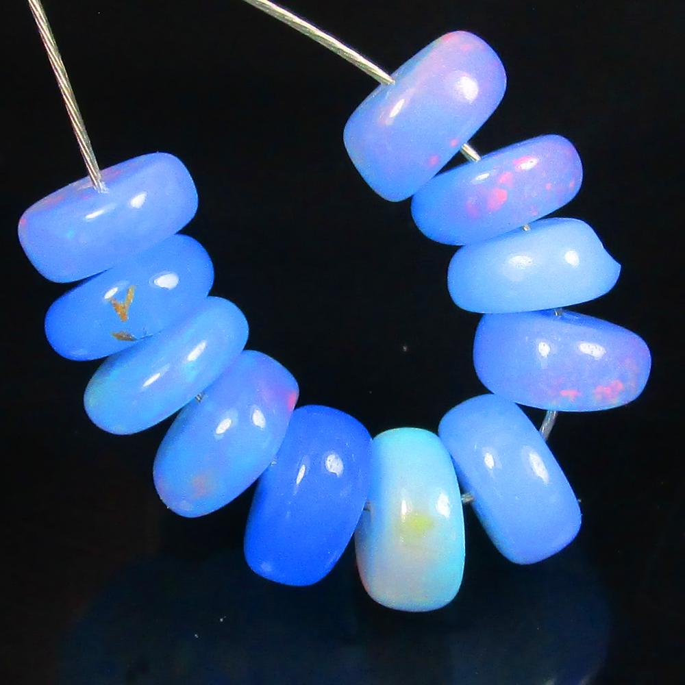 3.43 Ctw Natural 11 Drilled Blue Fire Opal Beads: No Reserve! Title: 3.43 Ctw Natural 11 Drilled Blue Fire Opal Beads Stone Clarity: Transparent Gemstones: Natural Blue Opal Beads Carat Weights: 3.43 Size/Dimensions: 5.10 to 5.70 mm / 11 PC's Additio