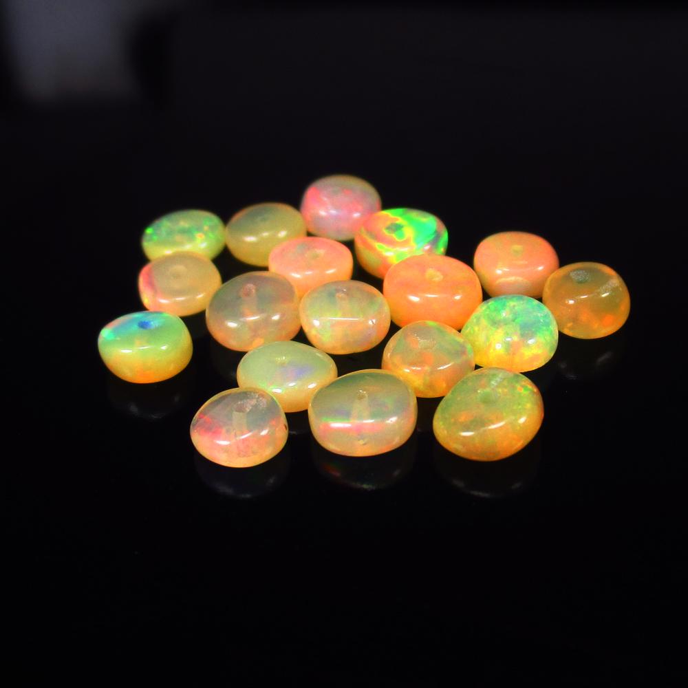 Natural Multicolor Opal Beads - 5.22 Ct: No Reserve! Title: Natural Multicolor Opal Beads - 5.22 Ct Origin: Ethiopia Weight: 5.22 Size/Dimensions: 4.7 - 5.2 mm Additional Information: Pieces : 18 No's / Shape : Drilled Round Beads / Clarity 