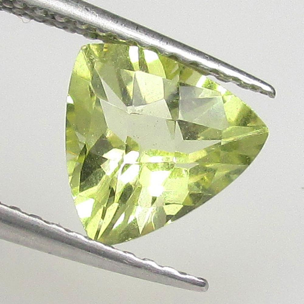 1.50 Ctw Natural Lemon Quartz Trillion Cut: No Reserve! Title: 1.50 Ctw Natural Lemon Quartz Trillion Cut Stone Clarity: VVS Gemstones: Natural Lemon Quartz Carat Weights: 1.50 Size/Dimensions: 8.20 x 8.20 x 5.40 mm Additional Information: Good