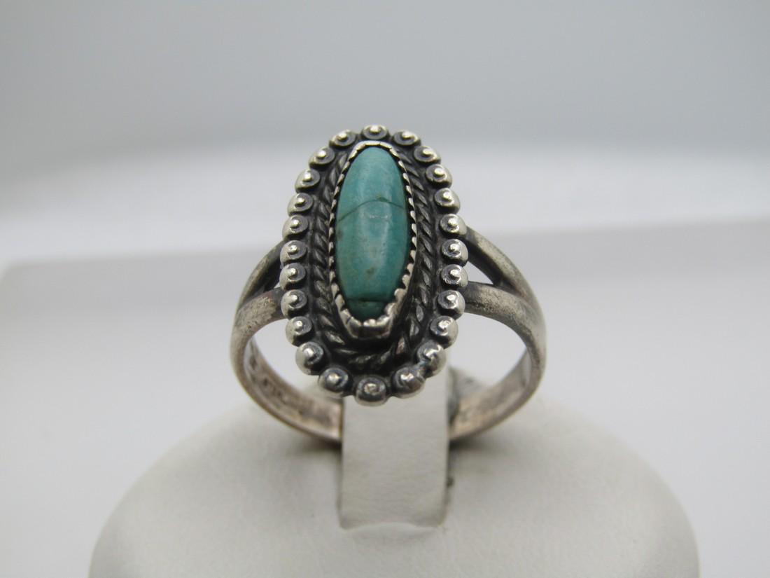 Vintage Sterling Southwestern Turquoise Ring, Bell Trading, Sz. 8.5, 1960's-1970's: Vintage Sterling Southwestern Turquoise Ring, Sz. 8.5, 1960's-1970's. Signed with the Bell Trading maker's mark and marked sterling and tests as sterling with a weight of appx. 3.91 gr. It has an appx