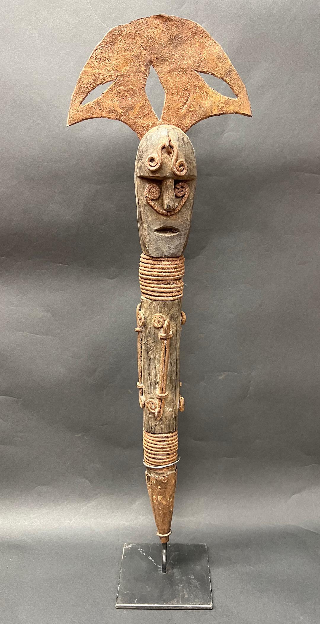 Nigerian Weapon with Base: Title: Nigerian Weapon with Base Date/Period: Late 20th Century Dimension: 30'' h x 9" w Materials: Wood Additional Information: African Tribal Art Nigerian Weapon with Base Reserve: $300.00 Shipping: