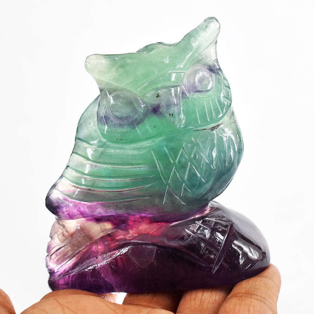 1367.00 Cts Multicolor Fluorite Hand-Carved Crystal Owl Gemstone: Gorgeous 1367.00 Cts Multicolor Fluorite Hand Carved Crystal Owl Gemstone Carving. Amazing Multicolor Fluorite Carving of Owl . The beautiful masterpiece is carved from a single Multicolor Fluorite Ro