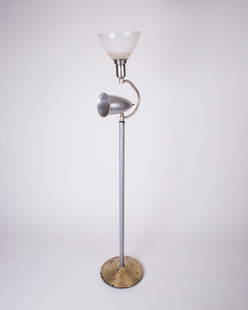 Early mid century Stilnovo Arteluce in the manner of: Interesting early mid century in the style of Stilnovo , odd and inusual shape . Rewired with US Socket , some oxidation on the stripped metal . H.58.5 in x Base 12 in with swiveling spot . Reserve: $