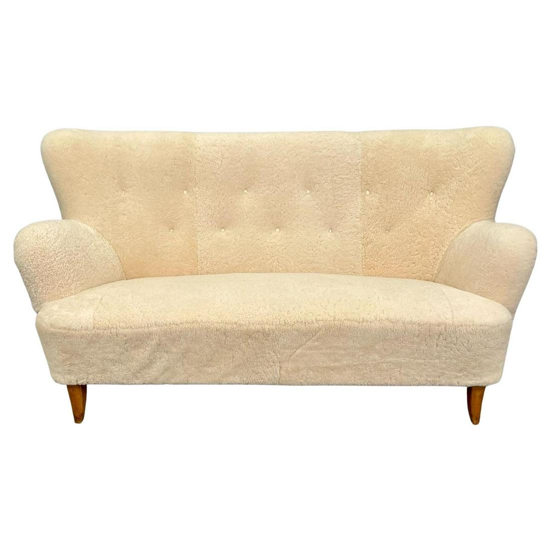 Swedish Mid-Century Modern Sheepskin Sofa / Settee / Loveseat by Asko, Finland: Title: Swedish Mid-Century Modern Sheepskin Sofa / Settee / Loveseat by Asko, Finland Description: Mid-Century Modern 'Laila' Lounge Chairs in Sheepskin by Ilmari Lappalainen for Asko, Finland Pair of