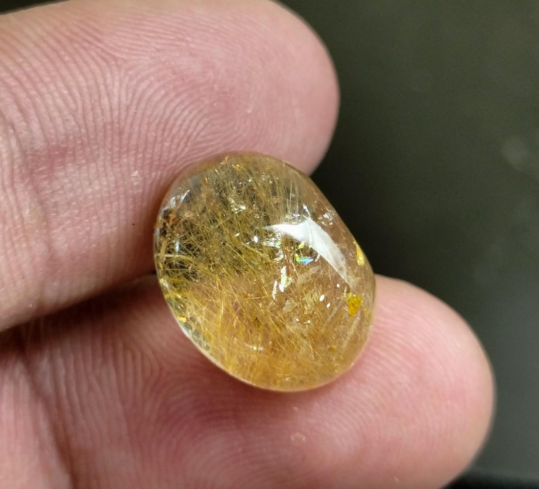 10.60 Carats Amazing Natural Golden Rutile Quartz Cab: Title: 10.60 Carats Amazing Natural Golden Rutile Quartz Cab Carat Weights: 10.60 Carat Size/Dimensions: 14x11x8 mm Origin: Pakistan Reserve: $20.00 Shipping: Domestic: Flat-rate of$10.00 to anywhere 
