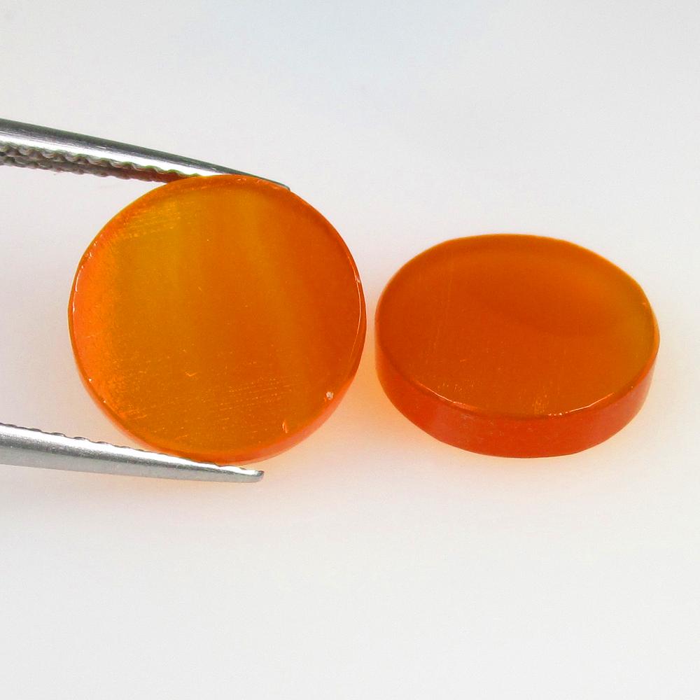 5.70 Ctw Natural Orange Carnelian Round Pair: No Reserve! Title: 5.70 Ctw Natural Orange Carnelian Round Pair Stone Clarity: Semi-Transparent Gemstones: Natural Carnelian Carat Weights: 5.7 Size/Dimensions: 11.00 x 11.00 x 2.50 mm / 2 Pc's Additi