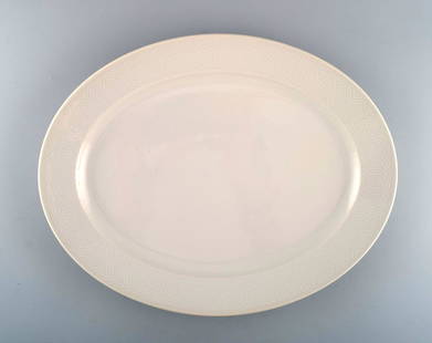 Royal Copenhagen. Salto Service, White. Large oval serving dish. 1960s.: Royal Copenhagen. Salto Service, White. Large oval serving dish. 1960s. Measures: 38 x 29.5 cm. In excellent condition. 1st factory quality. Designed by Axel Salto in 1956. Reserve: $140.00 Shipping: