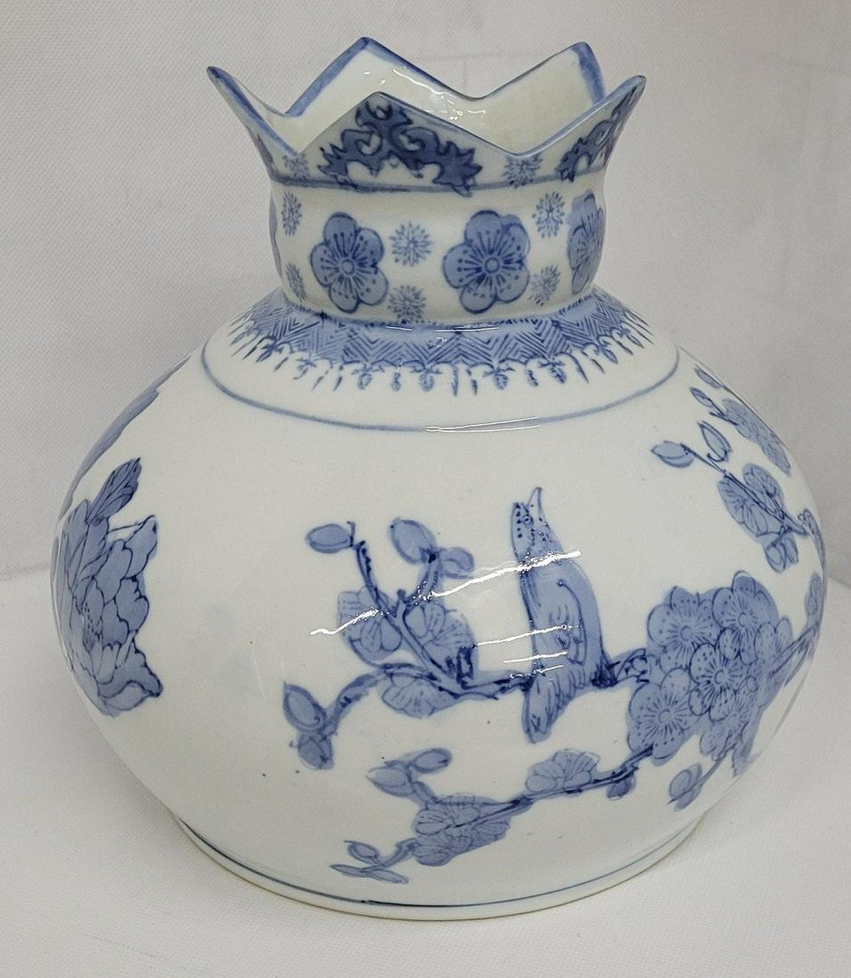 Vintage Asian Table Vase Antique Oriental Blue White Birds Unique Design: Vintage from the 1990s Materials: ceramic, pottery Width: 8 inches Height: 9 inches Depth: 8 inches Description Vintage Asian Table Vase Antique Oriental Blue White Birds Unique Design In good working