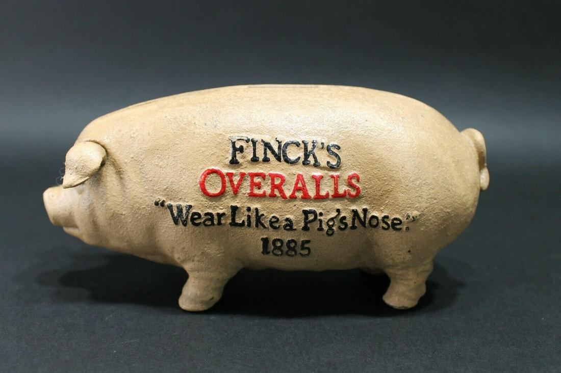 FINCK'S "OVERALLS" 'WEAR LIKE A PIG'S NOSE' 1885 Cast Iron Coin Bank (1 of 12)