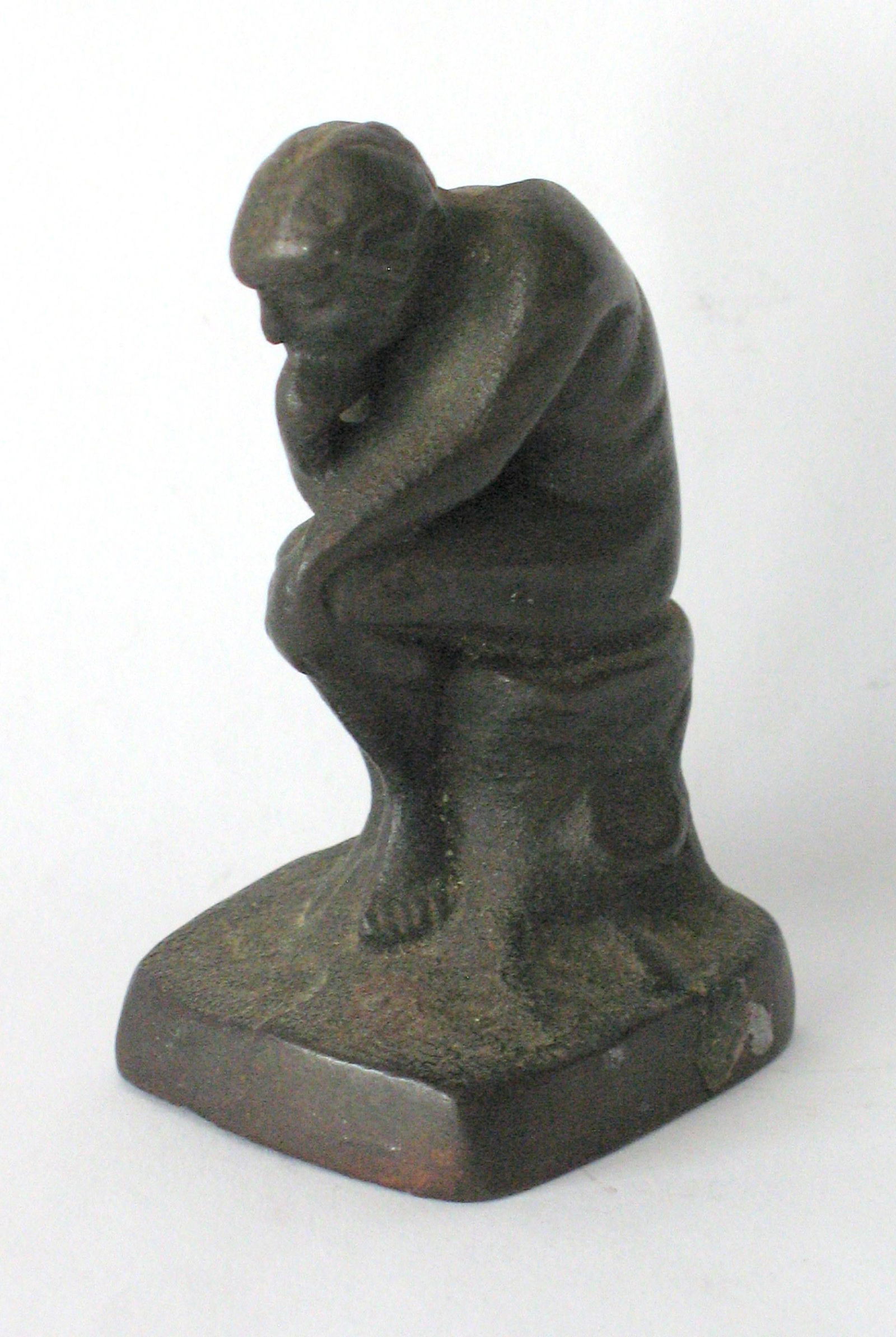 Vintage cast metal statue of the “THINKER”. (1 of 3)