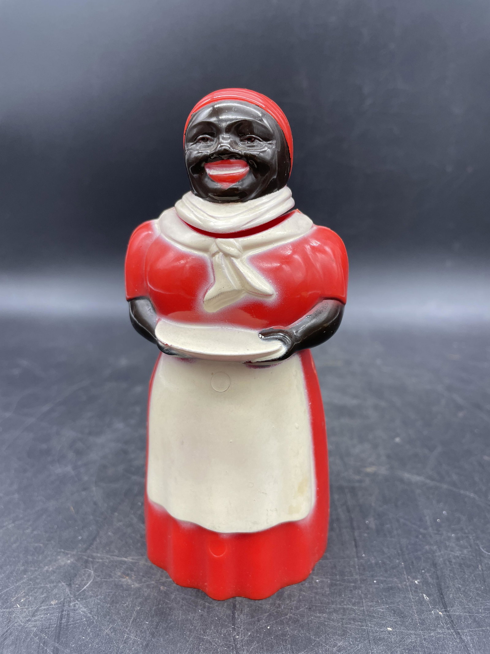Vintage AUNT JEMIMA SYRUP CONTAINER F&F MOLD & DIE WORKS: Title: Vintage AUNT JEMIMA SYRUP CONTAINER F&F MOLD & DIE WORKS Date/Period: approx 1930-50's Dimension: approx 5.5 x 2.5 Material: plastic Additional Information: AUNT JEMIMA SYRUP CONTAINER F&F MOLD