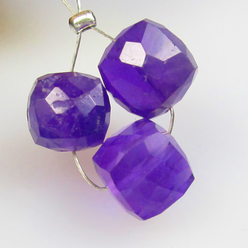 10.67 Ctw Natural Drilled Purple Amethyst Square Beads: No Reserve! Title: 10.67 Ctw Natural Drilled Purple Amethyst Square Beads Stone Clarity: Transparent Gemstones: Natural Amethyst Beads Carat Weights: 10.67 Size/Dimensions: 7.7x7.7 - 8.0x8.0 mm / 3 Pc