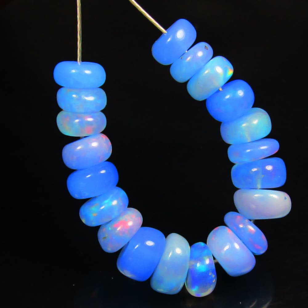 4.72 Ctw Natural 20 Drilled Neon Blue Fire Opal Beads: No Reserve! Title: 4.72 Ctw Natural 20 Drilled Neon Blue Fire Opal Beads Stone Clarity: Transparent Gemstones: Natural Opal Beads Carat Weights: 4.72 Size/Dimensions: 4.30 to 5.10 mm / 20 PC's Additio