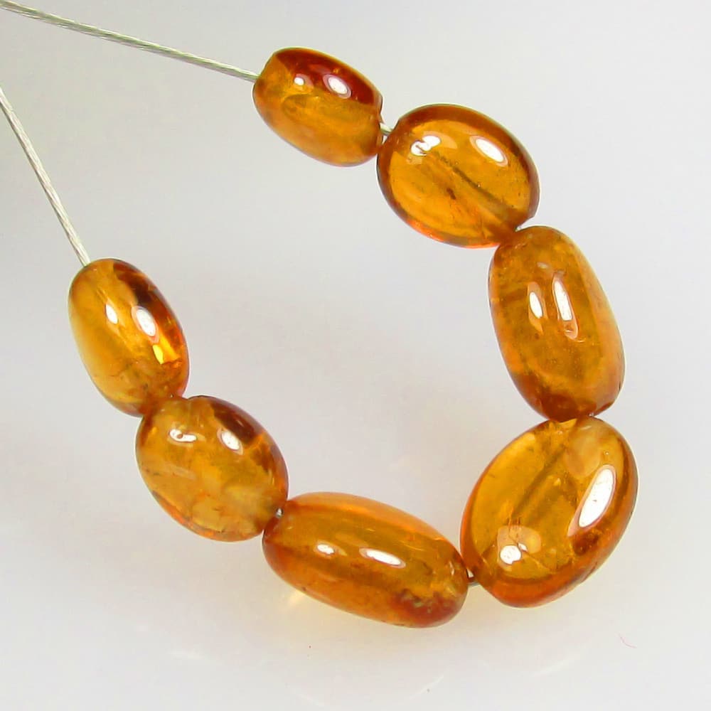 5.29 Ctw Natural 7 Hessonite Garnet Dumble Beads (1 of 2)