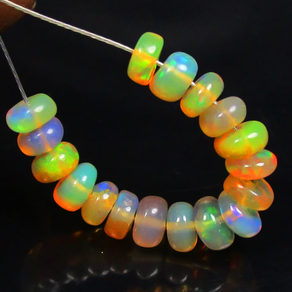 3.25 Ctw Natural 17 Drilled Fire Opal Beads: No Reserve! Title: 3.25 Ctw Natural 17 Drilled Fire Opal Beads Stone Clarity: Transparent Gemstones: Natural Fire Opal Beads Carat Weights: 3.25 Size/Dimensions: 4.10 to 4.60 mm / 17 PC's Additional I