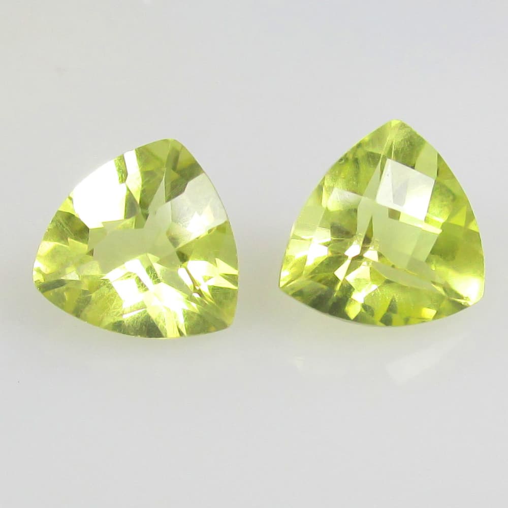 3.45 Ctw Natural Lemon Quartz Trillion Pair: No Reserve! Title: 3.45 Ctw Natural Lemon Quartz Trillion Pair Stone Clarity: VVS Gemstones: Natural Lemon Quartz Carat Weights: 3.45 Size/Dimensions: 8.30 x 8.30 x 5.80 mm / 2 Pc's Additional Informa