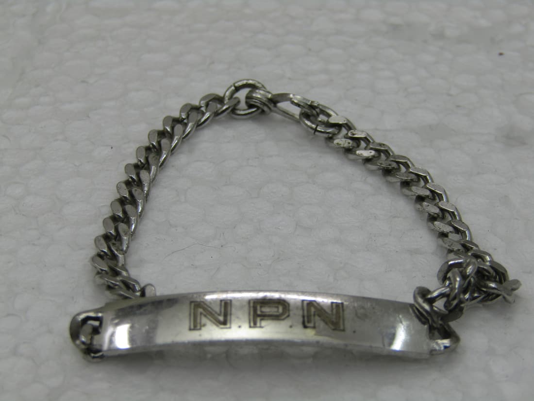 Vintage Sterling Silver Engraved NPN Bracelet, 6.5" , 6.3mm wide. Elco: Vintage Sterling Silver Engraved NPN Bracelet, 6.5" , 6.3mm wide. Elco signed. Weight is appx. 8.44 grams. The engraved portion is 6.3mm wide and the chain is 4mm wide. Age is appx. 1960's. Curb-Link.