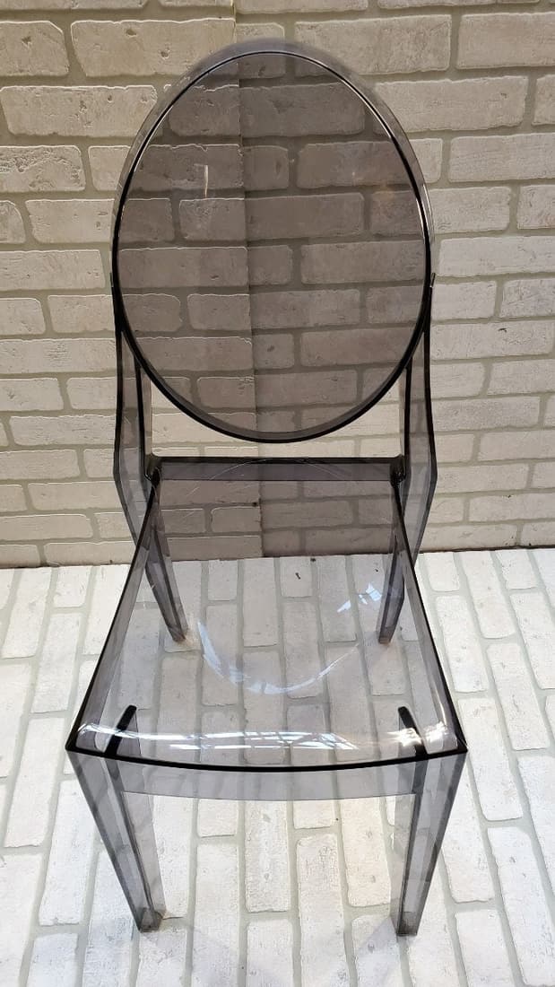 Victoria Ghost Smoke Chair by Philippe Starck for Kartell: Materials: plastic, lucite Description: Victoria Ghost Smoke Chair by Philippe Starck for Kartell H 35.5" W 15" D 15" Seat H 18.5" Great vintage condition Please be aware that most of the items are vi