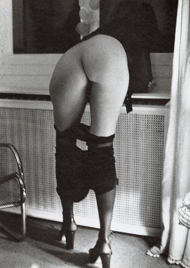 HELMUT NEWTON - In My Apartment, Paris, 1971: Artist: Helmut Newton Title: In My Apartment, Paris, 1971 Medium: Photo Litho, 1975, Italy Dimensions: 7.45x10.5" Description: Heat Wax Mounted on 11x14" Conservation board Artist Bio: Helmut Newton (