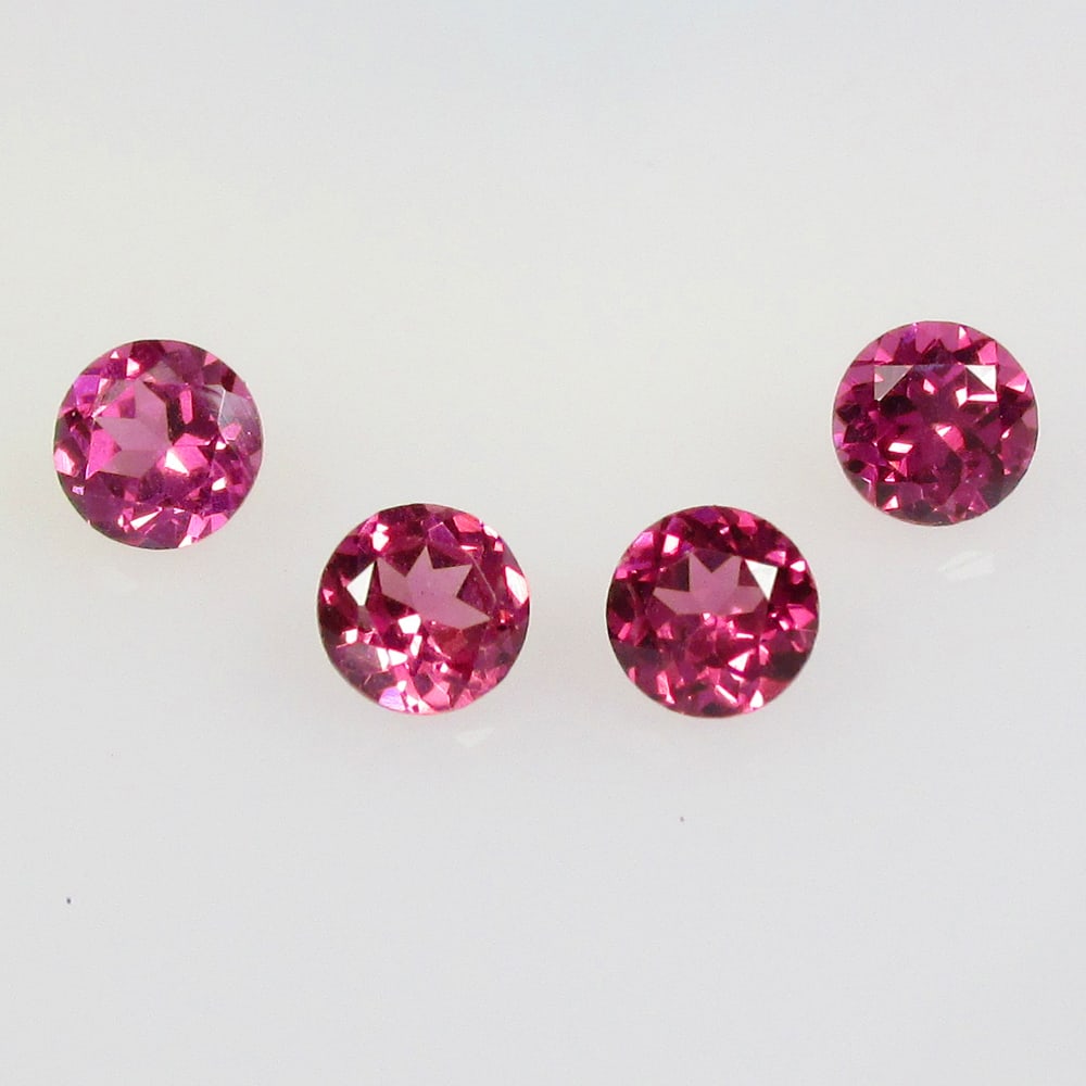 1.34 Ctw Natural Rhodolite Garnet Round Set: No Reserve! Title: 1.34 Ctw Natural Rhodolite Garnet Round Set Stone Clarity: VVS Gemstones: Natural Rhodolite Garnet Carat Weights: 1.34 Size/Dimensions: 4.00 x 4.00 x 3.00 mm / 4 Pc's Additional Inf