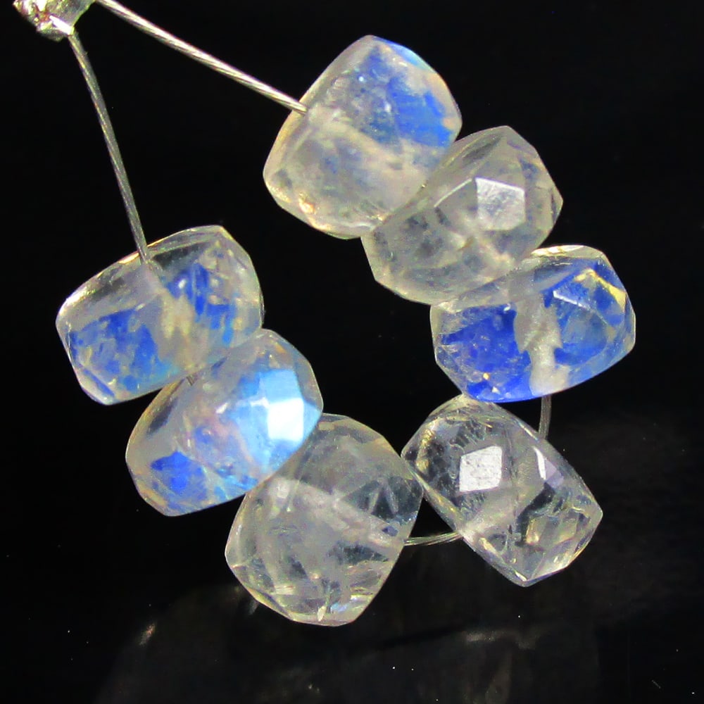 8.16 Ctw Natural 7 Drilled Blue Moonstone Round Beads: No Reserve! Title: 8.16 Ctw Natural 7 Drilled Blue Moonstone Round Beads Stone Clarity: Semi-Transparent Gemstones: Natural Moonstone Beads Carat Weights: 8.16 Size/Dimensions: 6.20 - 6.50 mm / 7 PC's