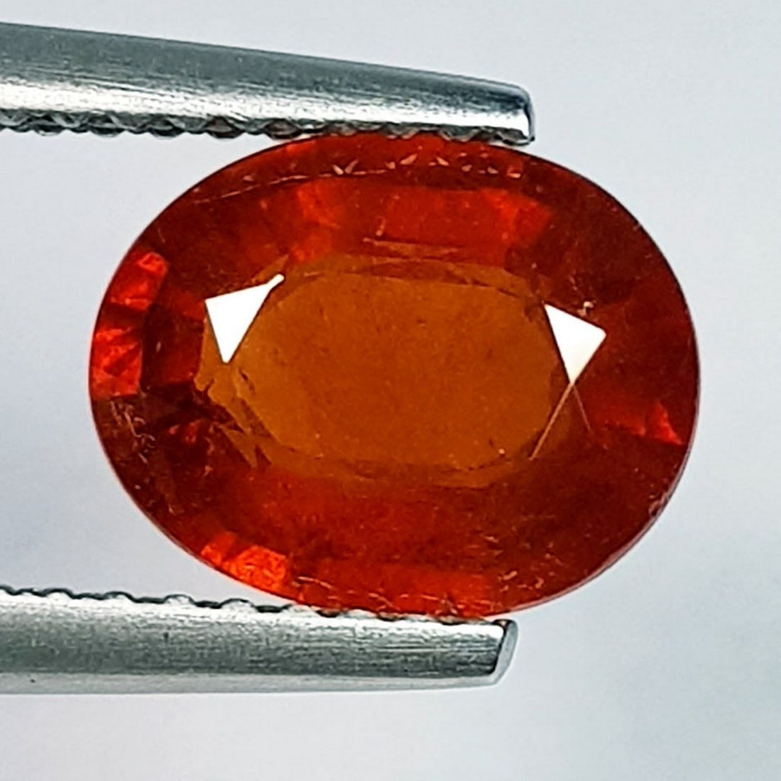 2.11 ctz Fine Fanta Orange Natural Mandarin Garnet: No Reserve! Title: 2.11 ctz Fine Fanta Orange Natural Mandarin Garnet Color/Clarity: Orange / VS Gemstone: Spessartite Garnet Carat Weights: 2.11 Size: 8.80 x 7.00 x 3.50 Additional Information: Oval 