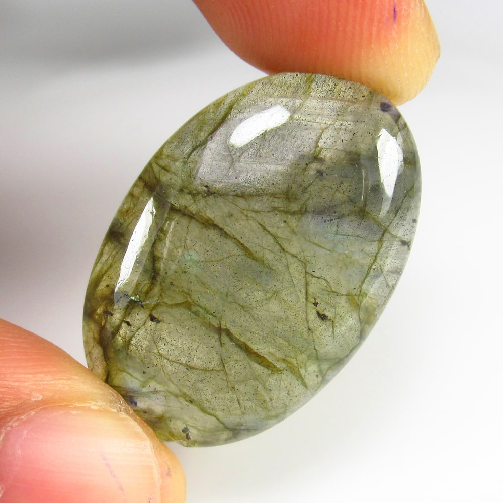 23.79 Ct - Natural Labradorite: No Reserve! Title: 23.79 Ct - Natural Labradorite Additional Information: Gemstone Gemstones: Labradoeite Carat Weights: 23.79 Size/Dimensions: 30.0 x 19.0 x 5.2 mm Additional Information: Pieces : 1