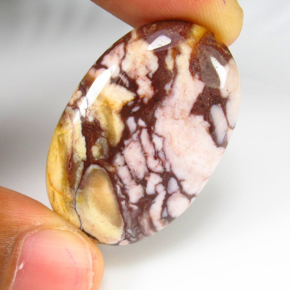 44.11 Ct - Natural Mookaite Jasper: No Reserve! Title: 44.11 Ct - Natural Mookaite Jasper Additional Information: Gemstone Gemstones: Jasper Carat Weights: 44.11 Size/Dimensions: 39.0 x 25.0 x 6.1 mm Additional Information: Pieces : 1 N